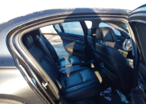 2012 BMW 750Li z USA, uszkodzony, nr VIN WBAKB8C56CC963199